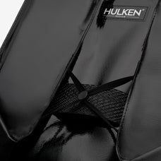 Black Hulken bag with visible branding on a dark background