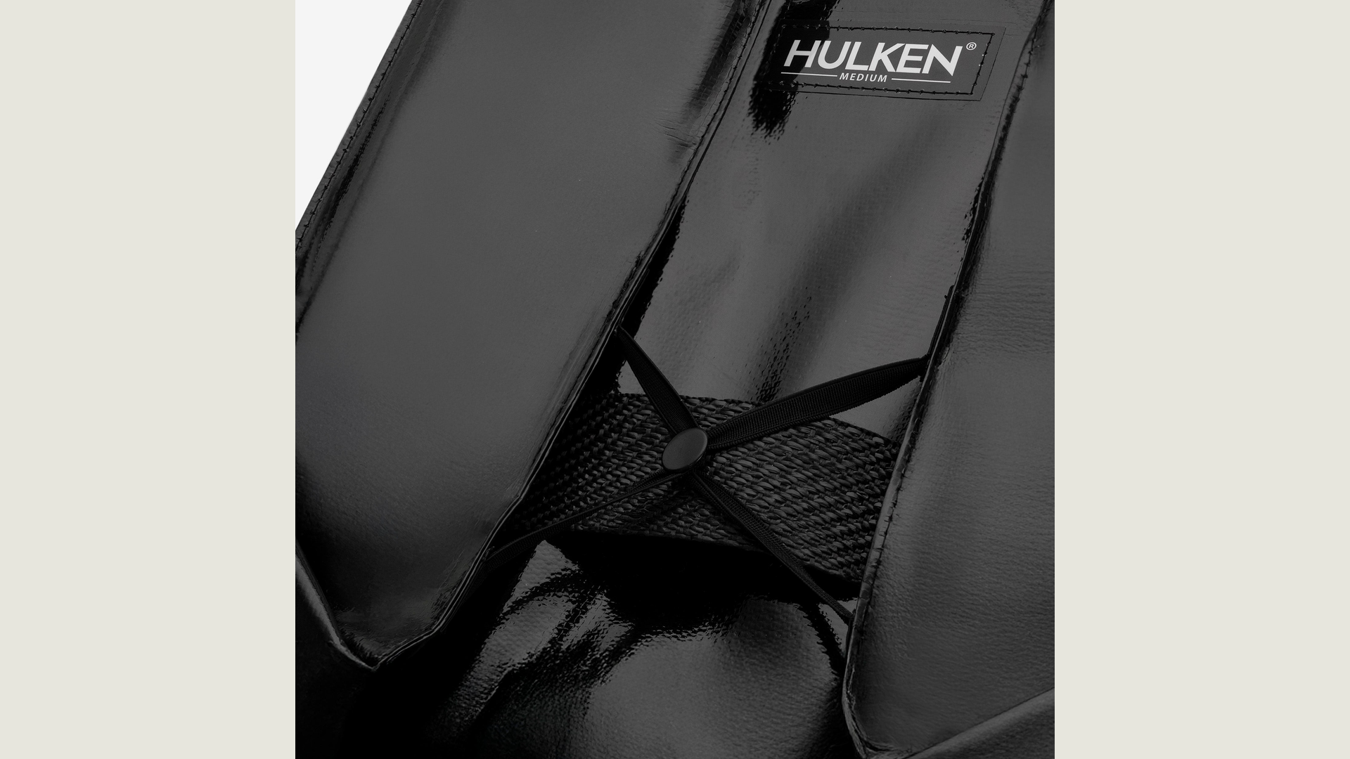 Hulken logo on a black carry-on